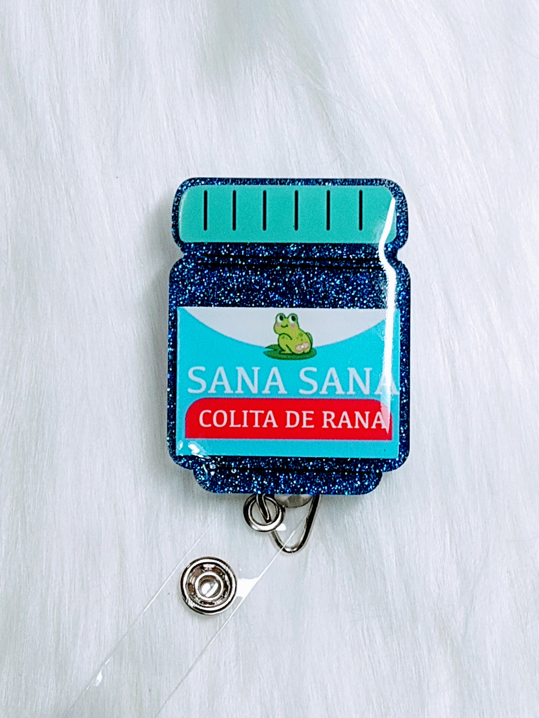 Sana Sana Medicine Jar Badge Reel